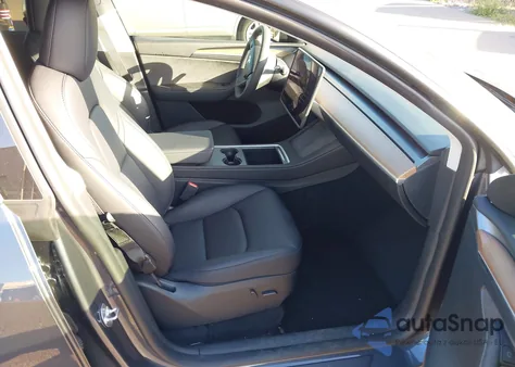 2023 Tesla Model Y Awd/Long Range Dual Motor All-Wheel Drive z USA, uszkodzony, nr VIN 7SAYGDEE0PF928836